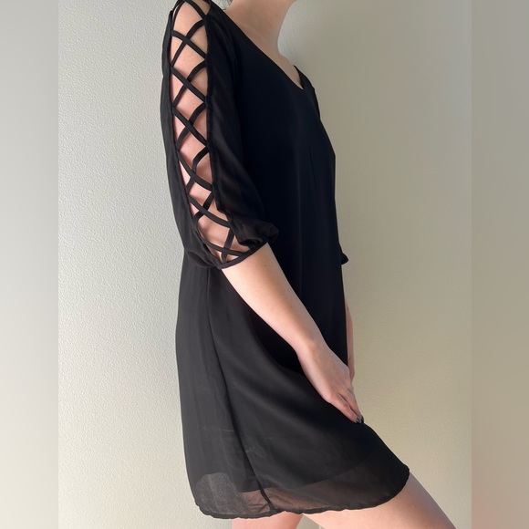 Dresses & Skirts - Sexy cutout crisscross black dress